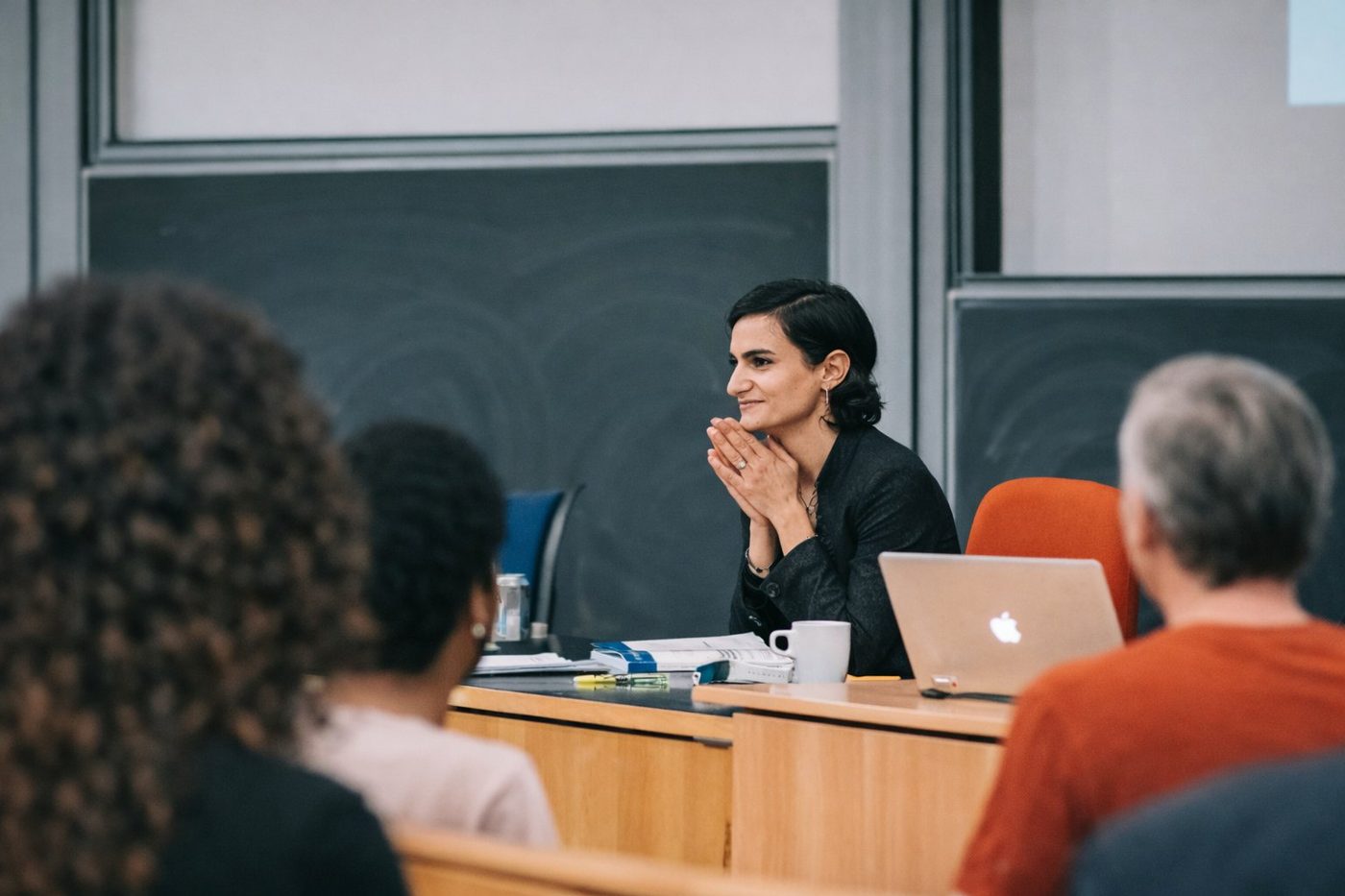 Dr. Pariya Kashfi teaching at university — applying decision science research to live audiences